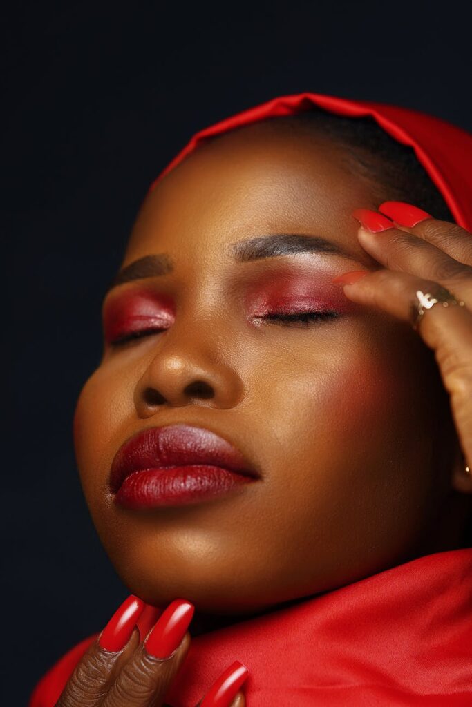 woman with red eyeshadow and lipstick