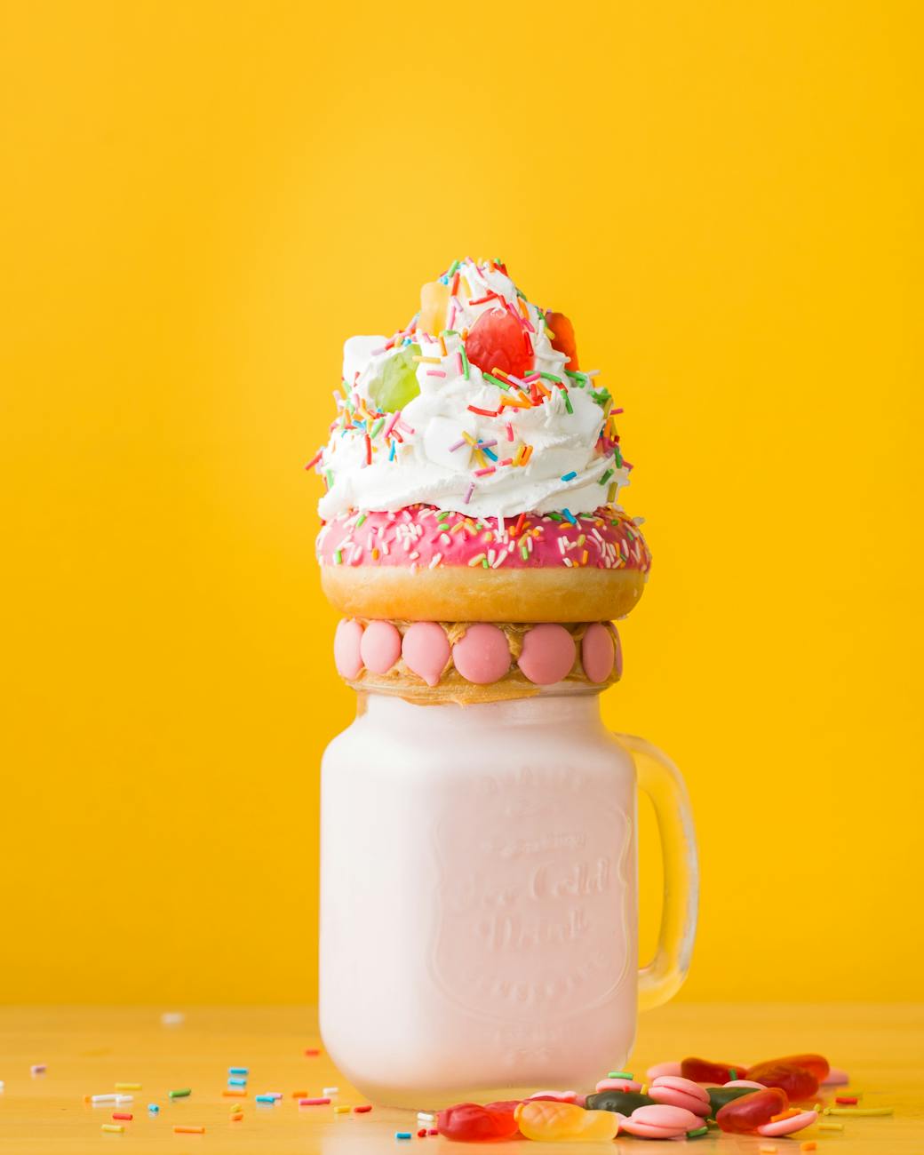 close up photo of dessert on top of the jar