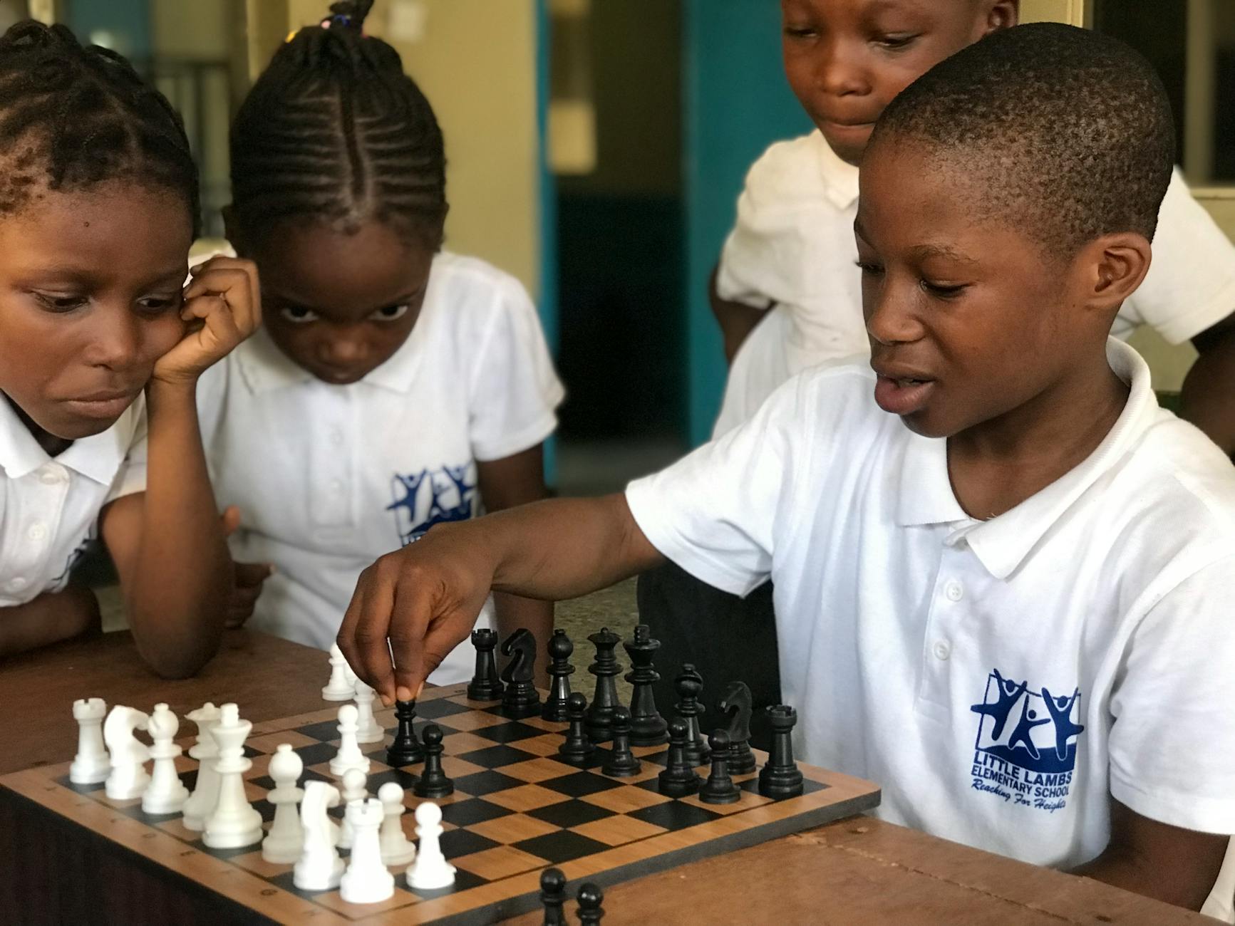 black children playing chess
