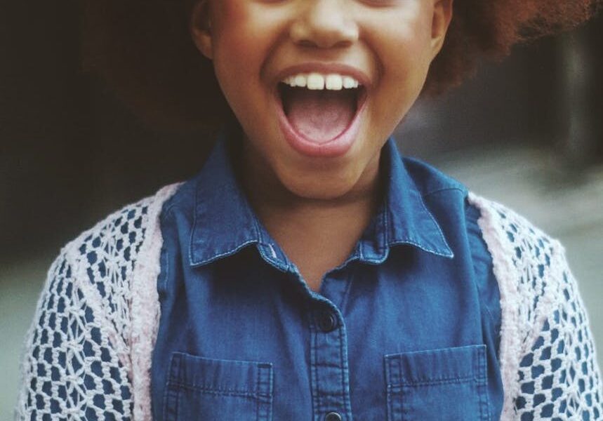 girl wearing blue denim dress shirt