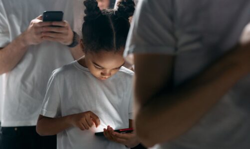 photo of girl using smartphone